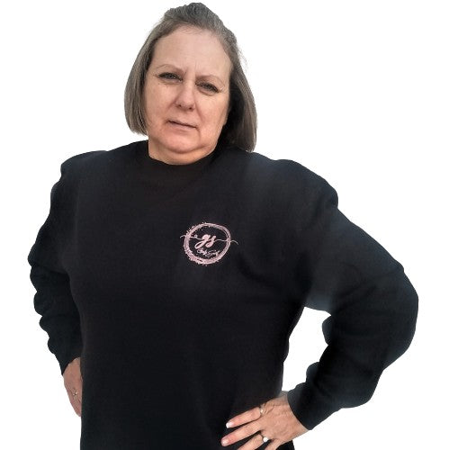 Our Girlz Secret black crewneck sweatshirt is a great way not to feel alone, and instead feel part of our Postpartum club, finding solidarity with fellow women experiencing PPD. DETAILS Black crewneck sweatshirt with our logo in pink. The logo appears on the front and back. 50% cotton, 50% polyester. Preshrunk. Professionally screen printed. Sizes women's S to 2XL (see chart in images). Tagless.
