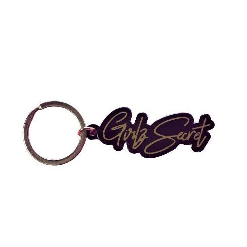 Super chic in black and gold, our Girlz Secret keychain is a stylish way to hold your car or house keys, or maybe even the key to your diary. I don't know about you, but I have a lot of keys and I often forget what they're for. A keyring like this one reminds me that I'm not alone, and there are others experiencing PPD. DETAILS 1.25 high x 2 inches wide keychain. 1.5-inch gold split ring. Features our Girlz Secret logo in black hard enamel with matte gold plating.