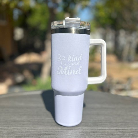 Nurture your mind and body with every sip from the Be Kind To Your Mind Ivory 40oz Tumbler – a thoughtful gift for those seeking peace of mind, especially postpartum depression awareness. Enjoy your favorite hot or cold beverage while promoting mental health one drink at a time.