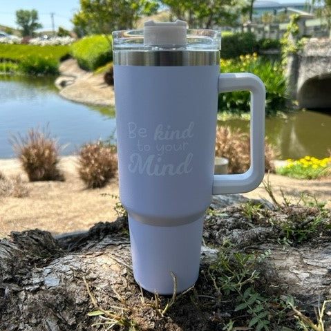 Nurture your mind and body with every sip from the Be Kind To Your Mind Ivory 40oz Tumbler – a thoughtful gift for those seeking peace of mind, especially postpartum depression awareness. Enjoy your favorite hot or cold beverage while promoting mental health one drink at a time.