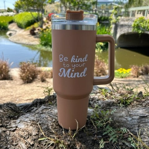 Indulge your senses and soothe your mind with our 40oz Mocha Tumbler - a perfect blend of mental wellness and coffee love.  Our Be Kind to Your Mind Mocha 40oz Tumbler is not just any ordinary drinkware. It's a reminder that mental wellness and self-care should always be at the top of our minds, especially for coffee enthusiasts who may sometimes forget to take care of themselves amidst their busy schedules. 