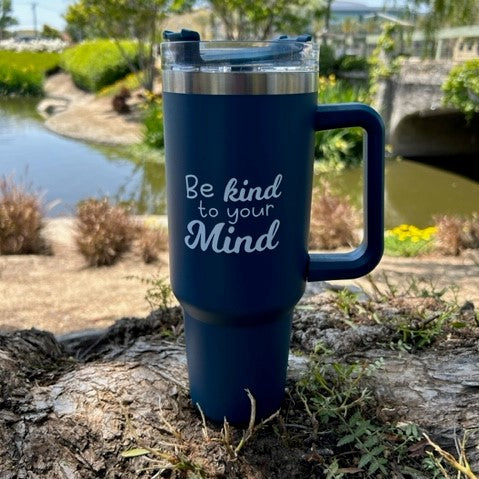 Sip in style and nurture your mind, with our navy blue tumbler designed to remind. Raise awareness for post-partum depression and mental health, while enjoying hot or cold beverages at your stealth. With straw included, this tumbler is perfect for you and me!  Introducing the Navy Blue Tumbler - a bold and striking drinkware item that embodies something far greater than cold or hot beverages.