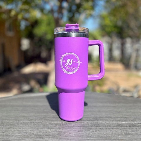 Sip in secrecy with the Girlz Secret Purple 40oz Tumbler, keeping your hot and cold beverages at perfect temperatures on the go. With a sleek design and easy-to-clean features, this tumbler is not just an accessory but also raises awareness for postpartum depression. Travel with our girlz secret logo proudly displayed on this spacious 40 oz capacity travel mug  Introducing the Girlz Secret Purple 40oz Tumbler, a unique and versatile drinkware option that offers both form and function. 