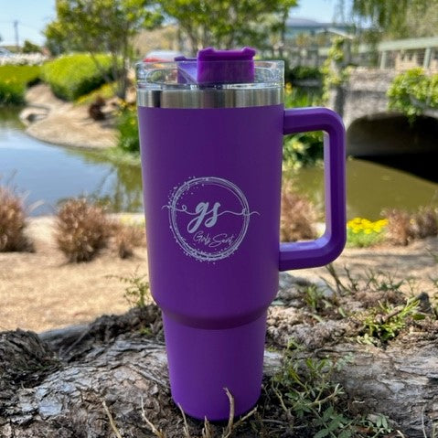 Sip in secrecy with the Girlz Secret Purple 40oz Tumbler, keeping your hot and cold beverages at perfect temperatures on the go. With a sleek design and easy-to-clean features, this tumbler is not just an accessory but also raises awareness for postpartum depression. Travel with our girlz secret logo proudly displayed on this spacious 40 oz capacity travel mug  Introducing the Girlz Secret Purple 40oz Tumbler, a unique and versatile drinkware option that offers both form and function. 