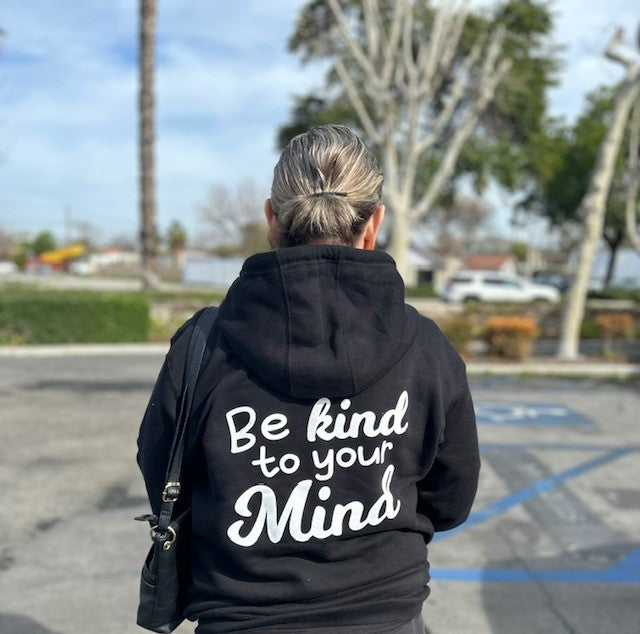 Zip up your kindness and take care of your mind with our Be Kind To Your Mind Hoodie, a reminder to love yourself and conquer depression.  The Be Kind To Your Mind Black Zipper Hoodie is more than just a piece of clothing. It embodies a meaningful message that goes beyond the surface level of fashion statements. This hoodie aims to remind people about the importance of taking care of their mental health and well-being, especially during challenging times such as depression. 