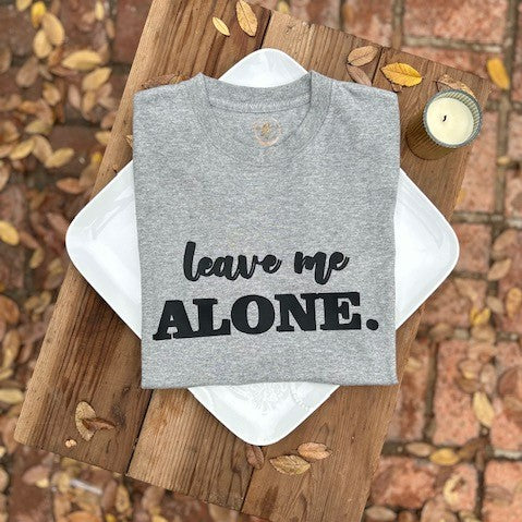 Our "Leave Me Alone" women's t-shirt is professionally screen printed featuring an ashy gray shirt with black lettering. Sometimes, being alone is necessary to focus on your mental health. During my time with PPD, I was in my own little world and I just wanted to be left alone with my baby. While I think the solitude helped me with the emotions I was feeling at the time, it also made me feel lonely and depressed.