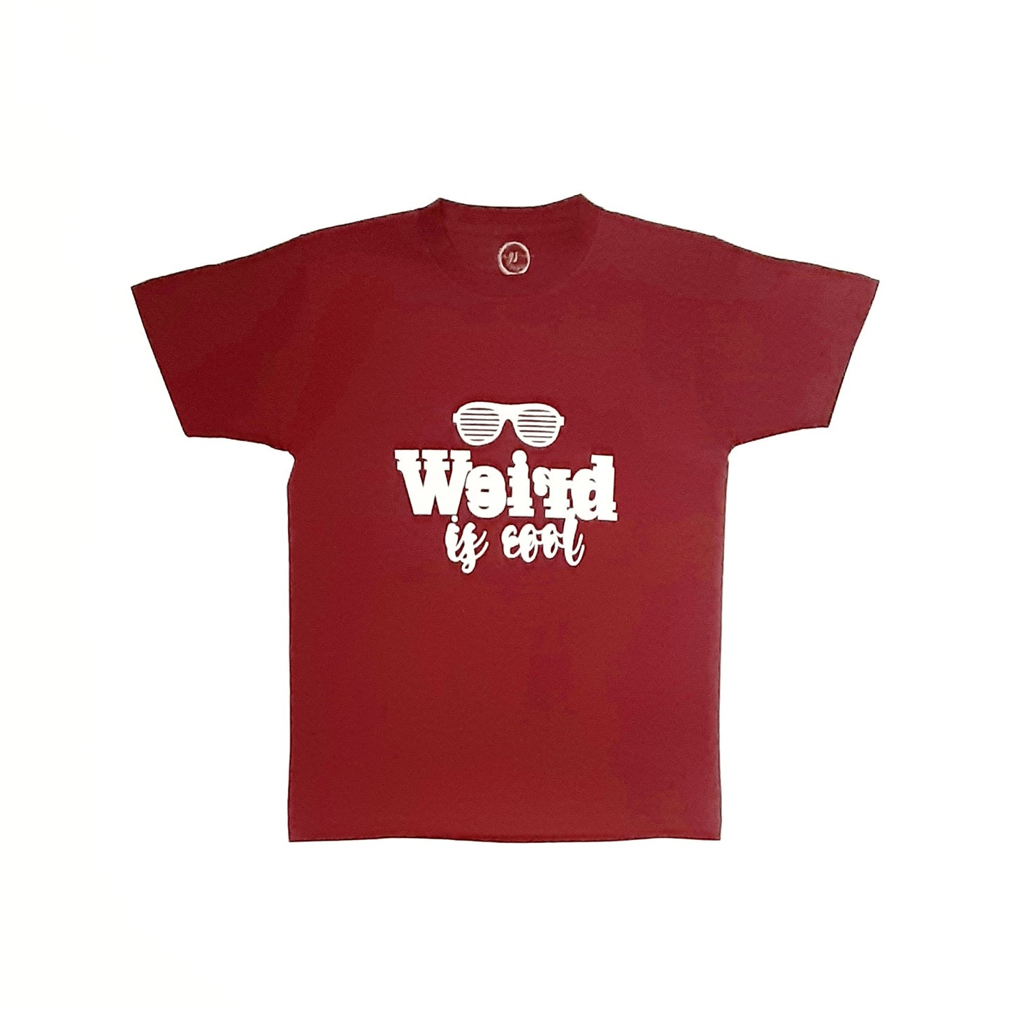 Our "Weird is Cool" women's t-shirt is professionally screen printed featuring a wine-colored shirt with blurred light gray letters and a pair of sunglasses over top.  I'll be honest, I love all things weird. Quite frankly, I can be a big weirdo myself sometimes. But when the daughter of a good friend was being called "weird" at school, it bothered me because being weird is what makes us special and different - and it's okay to be different, even cool!