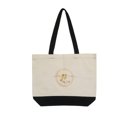 Our roomy Girlz Secret canvas tote bag is perfect as a book bag, market bag or to take to the beach.  I've always felt that you could never have too many tote bags lying around, and this one is such a great size, and an excellent way to show your support for others suffering from Postpartum Depression.  DETAILS  100% Cotton canvas. Beige with black straps and black bottom. Flat bottom so it can stand on its own. Our Girlz Secret logo appears on both sides of the bag.